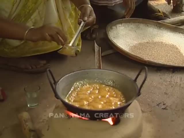 DELICIOUS FOOD 'TILER NARU' (A BALL OF SWEETMEAT MADE BY SESAME SEEDS) মজাদার তিলের নাড়ু