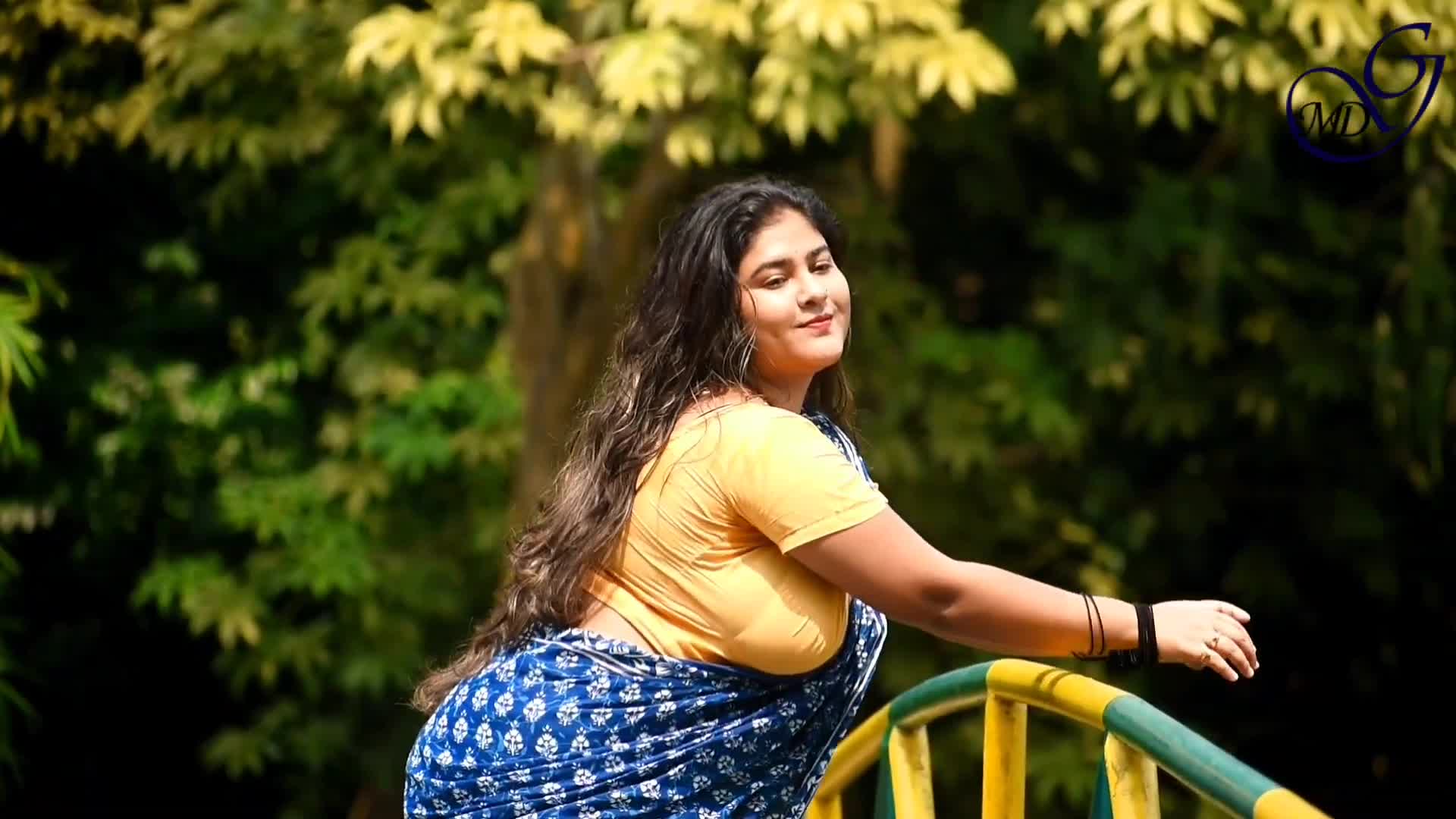 ⁣MEGHA IN BLUE SAREE AND SKIN COLORED BLOUSE VIDEO   DESI SAREE FASHION SHOOT