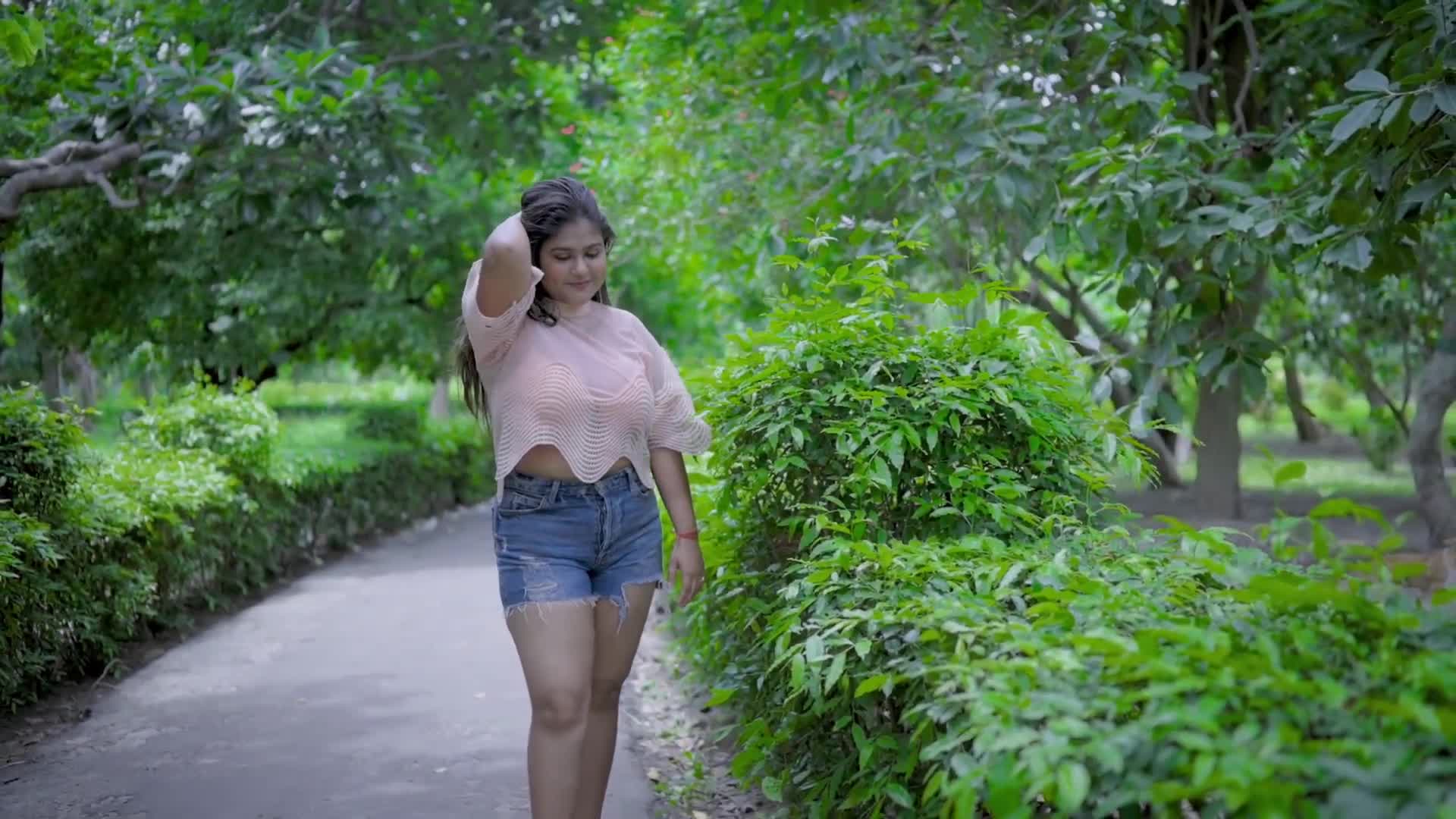 ⁣MEGHA DAS GHOSH IN A COVER UP TOP AND DENIM SHORTS WESTERN VIDEO   WESTERN FASHION VIDEO